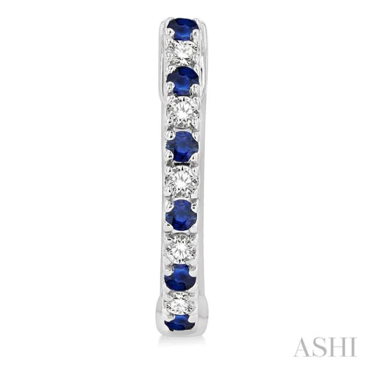 1/10 ctw Petite 1.35MM Sapphire and Round Cut Diamond Precious Fashion Huggies in 10K White Gold