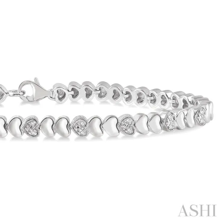 1/6 ctw Puffed Heart Plain and Round Cut Diamond Fashion Bracelet in Silver