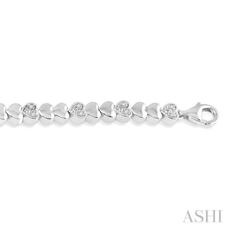 1/6 ctw Puffed Heart Plain and Round Cut Diamond Fashion Bracelet in Silver