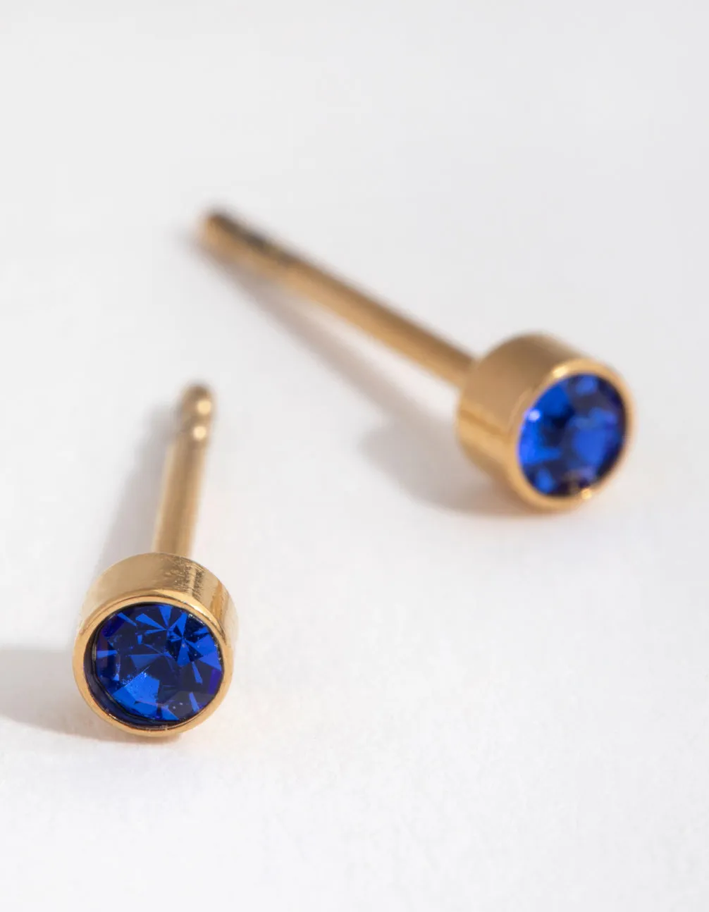 24 Carat Gold Plated Titanium September Sapphire Stud Earrings