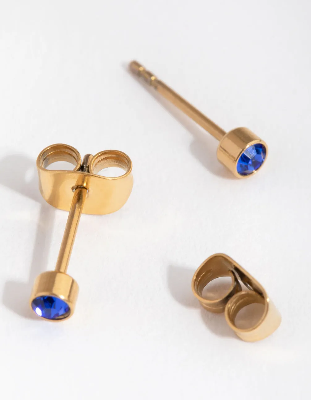 24 Carat Gold Plated Titanium September Sapphire Stud Earrings