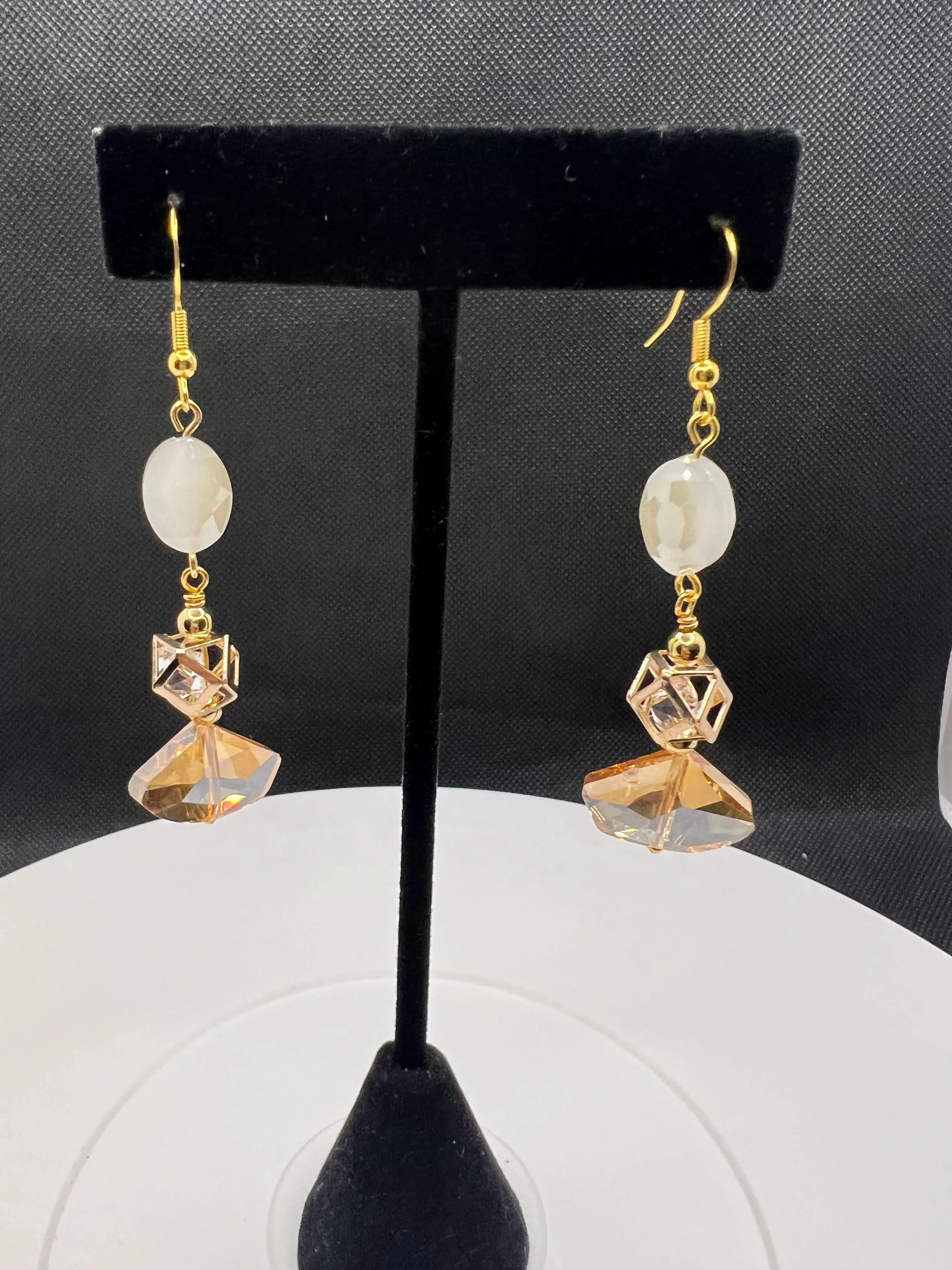 Champaign, Caged crystal and white dangle earrings