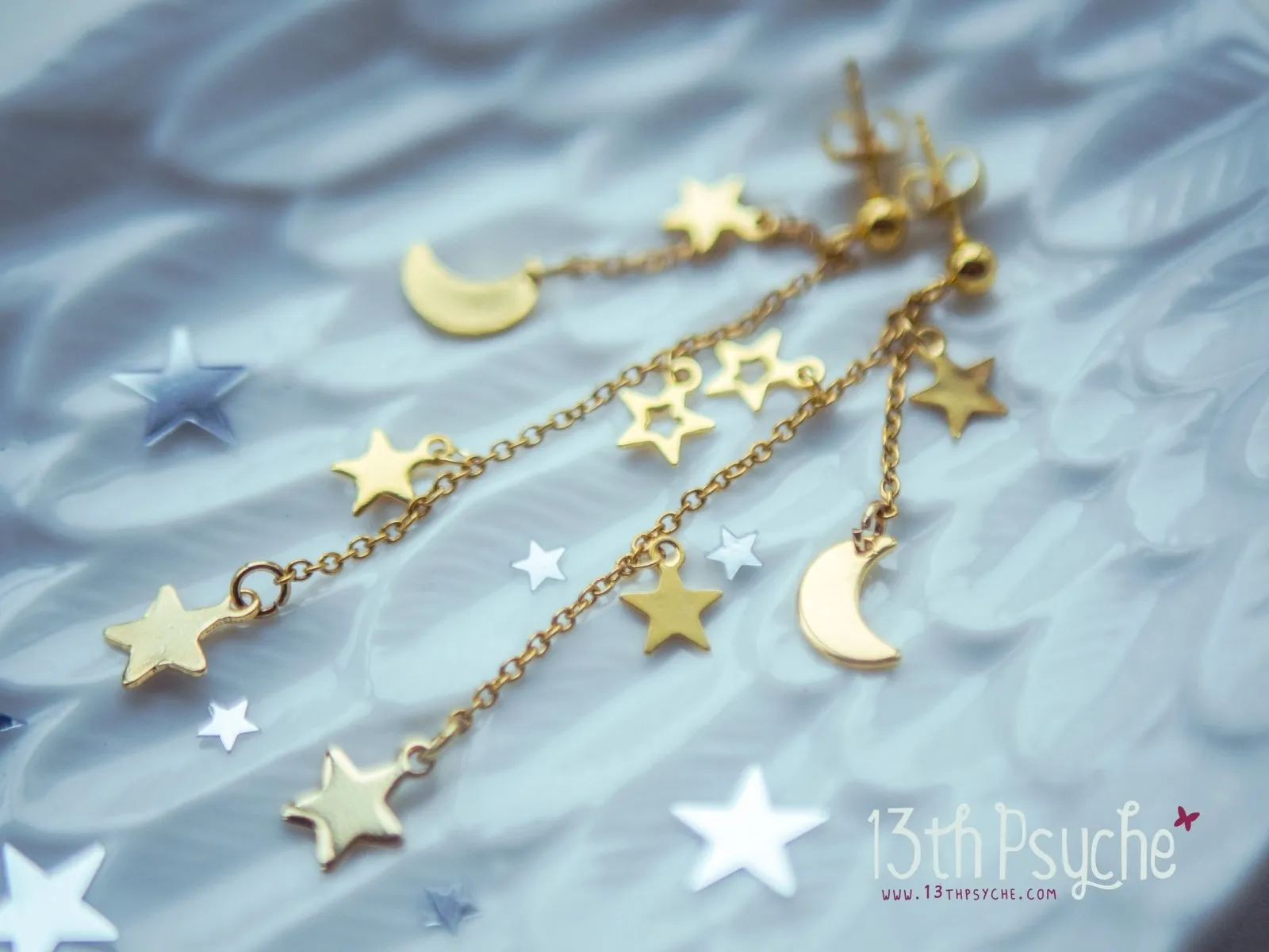 Gold moon and stars dangle earrings