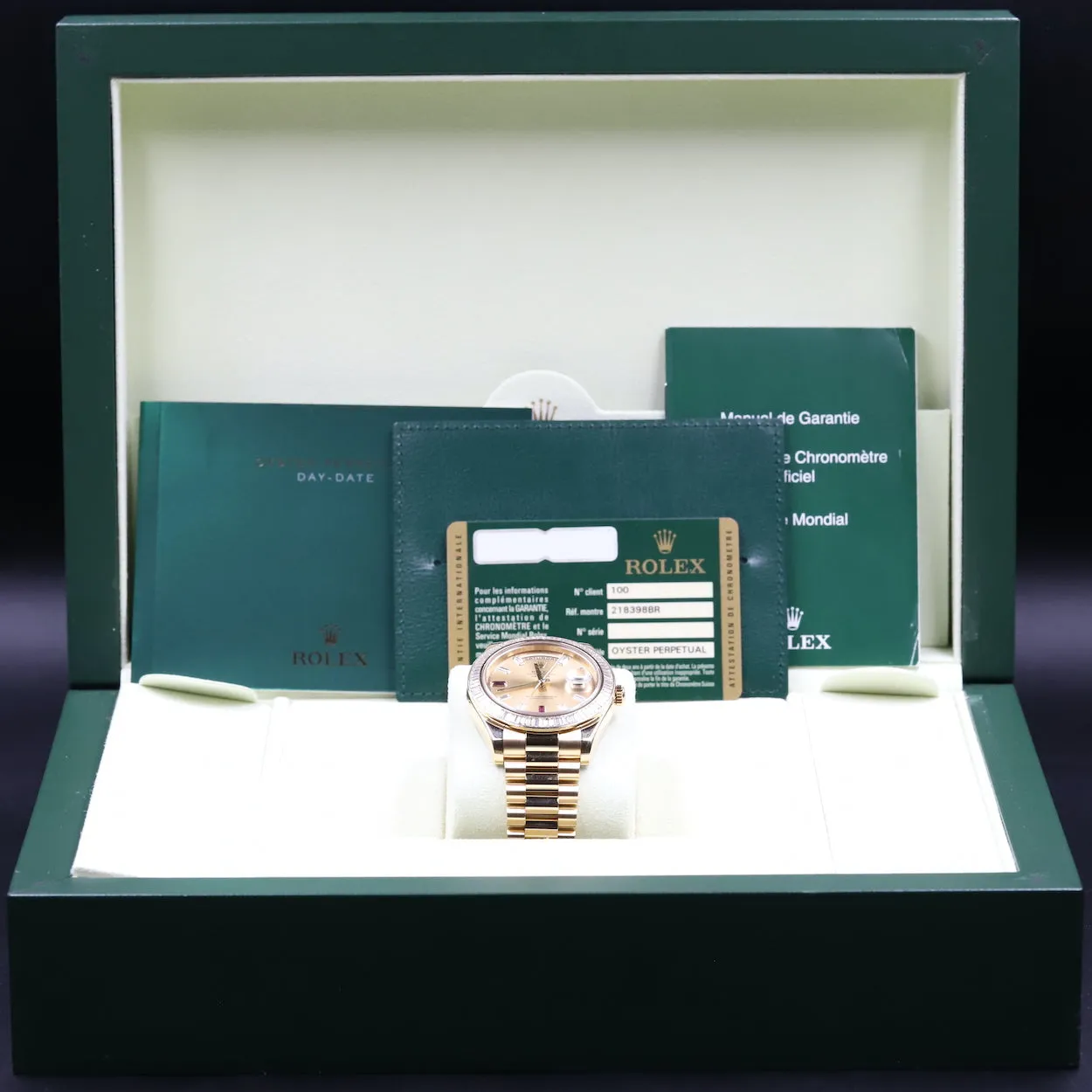 Rolex<br>218398BR Day-Date II Ruby Dial Diamond Bezel