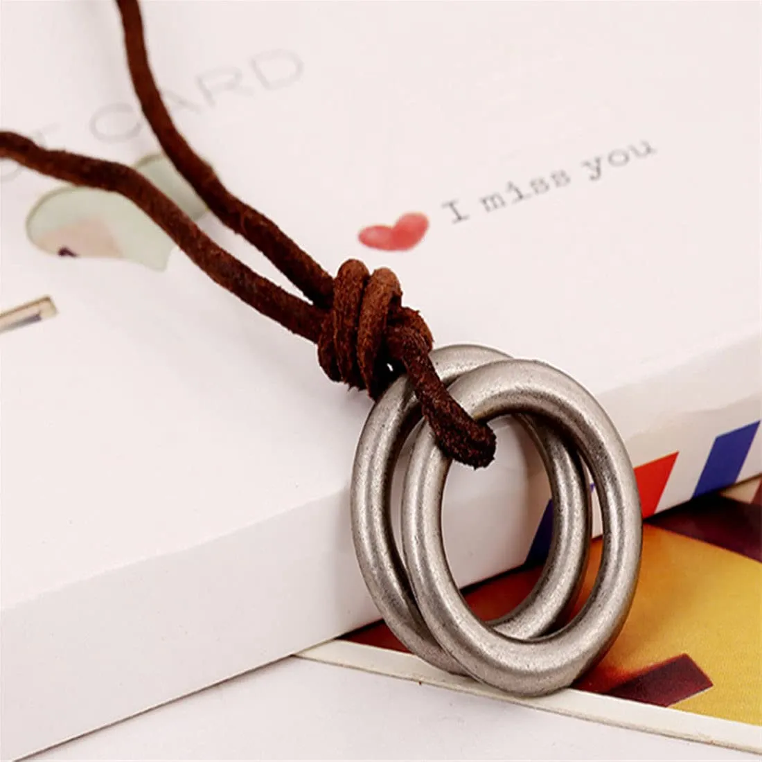 Yellow Chimes Stainless Steel Silver Circle Locket with Brown Leather Rope Pendant for Men and Boys