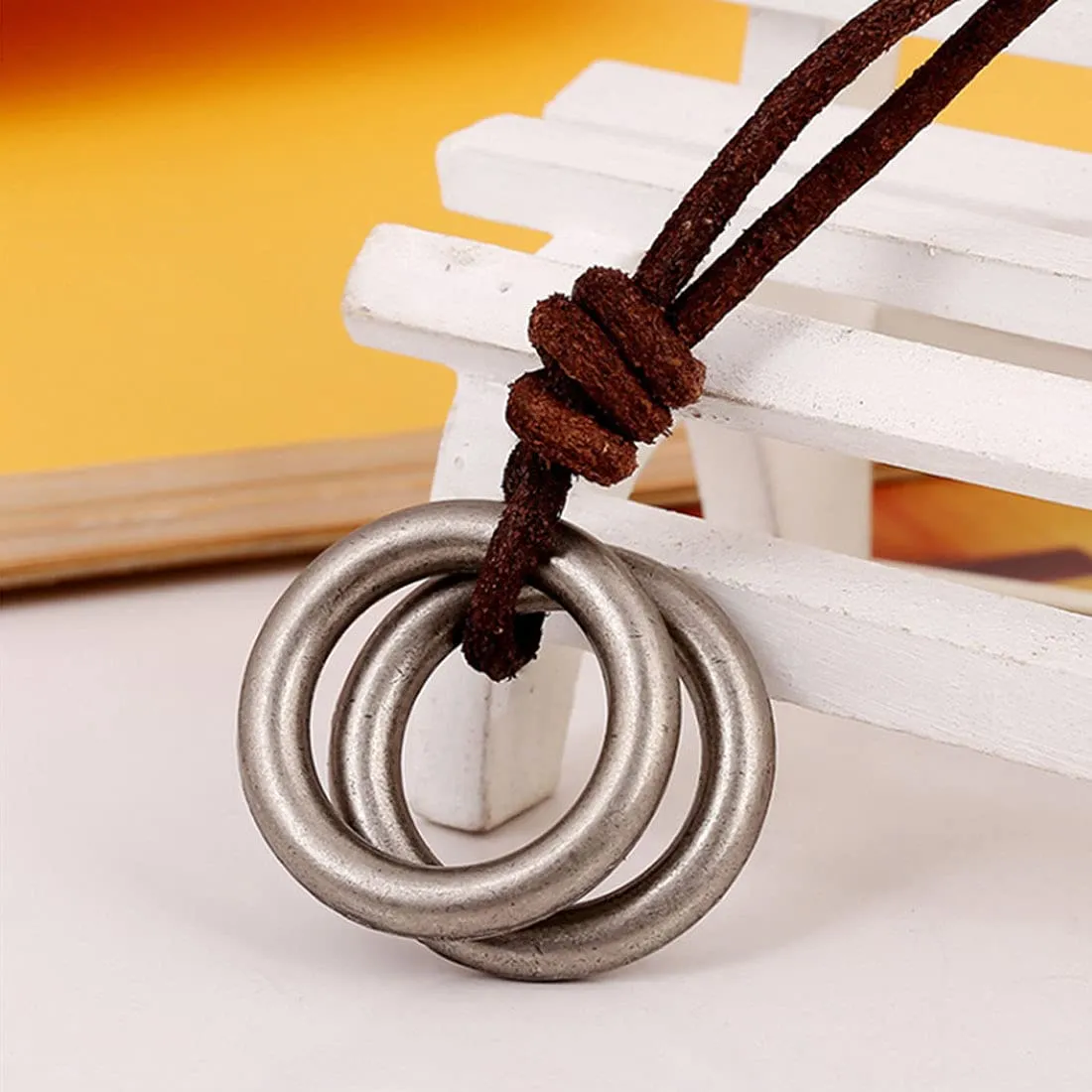 Yellow Chimes Stainless Steel Silver Circle Locket with Brown Leather Rope Pendant for Men and Boys